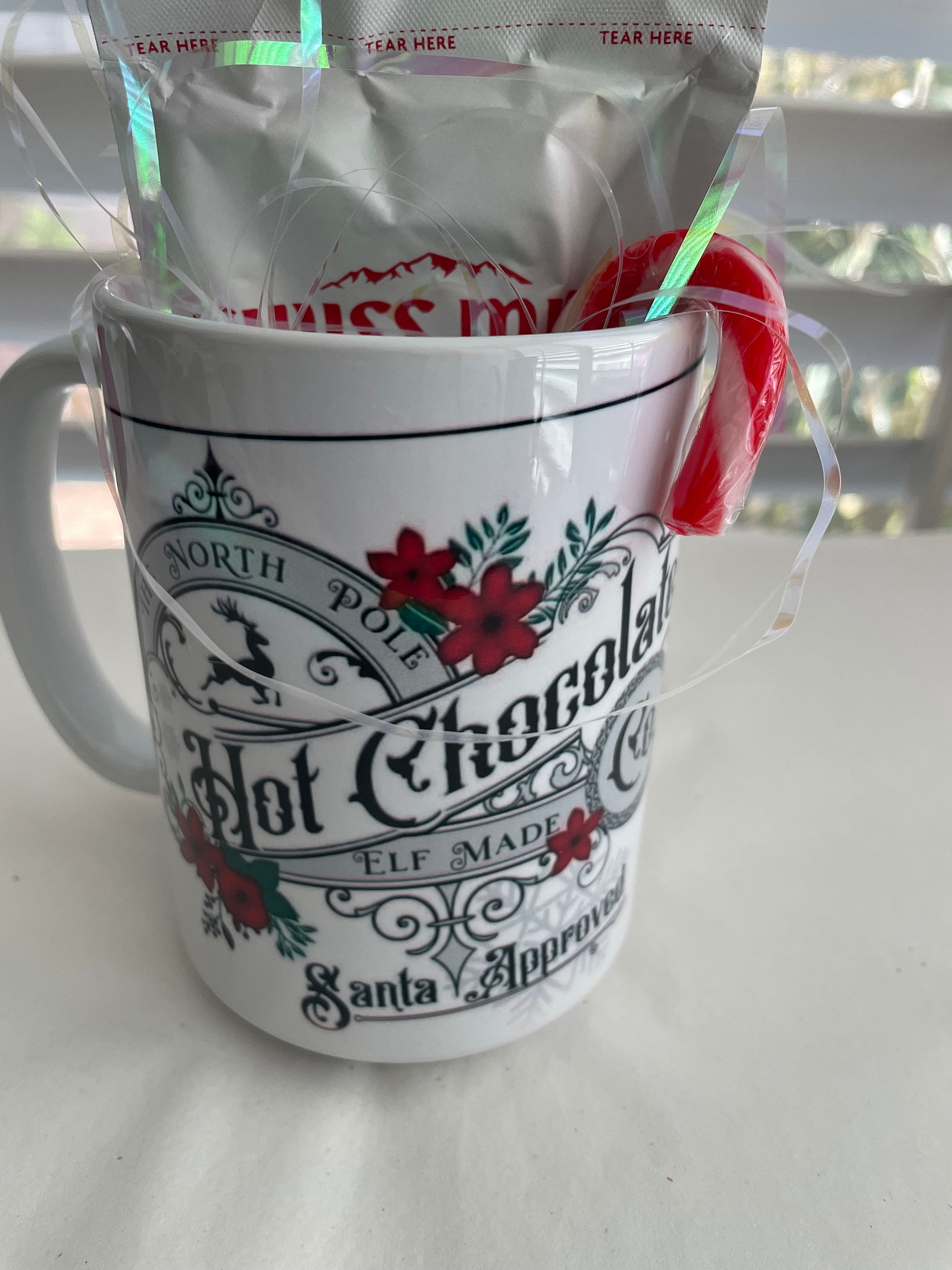 Merry Swissmiss mug with hot chocolate and candy cane for neighbors teachers friends Christmas gift